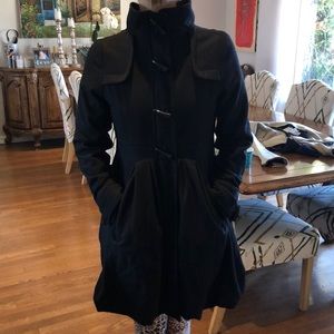 Classic Mid length peplum wool coat. Size small